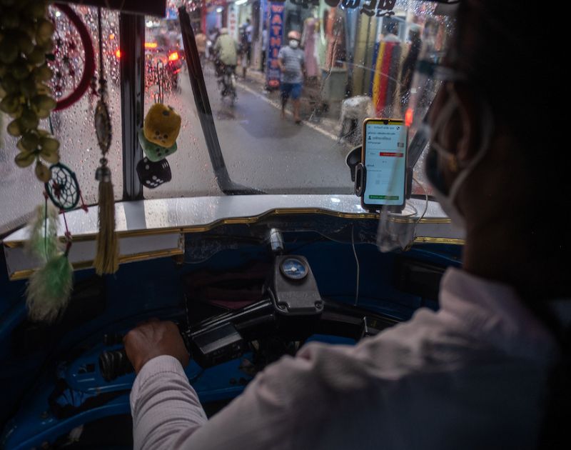 Ride hailing gig worker driving a Tuk tuk