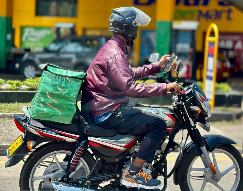 Delivery rider on a motorcycle